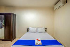 Hotel Bambu Kuning客房内的一张或多张床位
