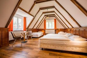 מיטה או מיטות בחדר ב-Penzión Jesenský
