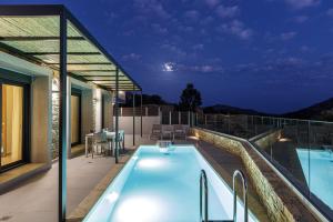 Πισίνα στο ή κοντά στο Porti Villas Aphrodite +104 φωτογραφίες