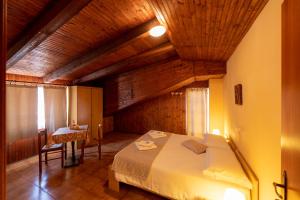 Postel nebo postele na pokoji v ubytování Hotel Valle Pesio Ristorante + 37 fotografií