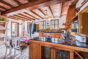 A kitchen or kitchenette at Finca Rafalet, Pollensa by Renthousing