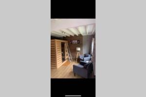 Istumisnurk majutusasutuses Gîte de charme en Ardennes