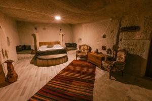 Krevet ili kreveti u jedinici u okviru objekta Mia Cappadocia Cave Hotel