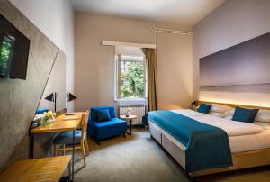 Postel nebo postele na pokoji v ubytování Hotel Istra - Liburnia