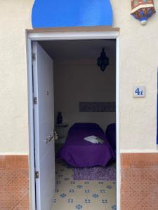 Łóżko lub łóżka w pokoju w obiekcie Antilla Riad
