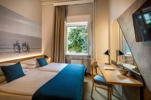 Postel nebo postele na pokoji v ubytování Hotel Istra - Liburnia