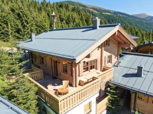 an aerial view of a house with a metal roof at Chalet Königsleiten 168 in Königsleiten