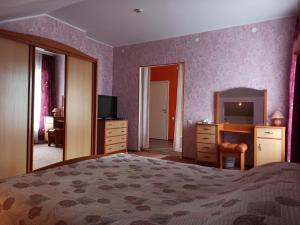 Postel nebo postele na pokoji v ubytování Central Hotel