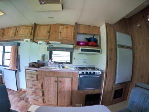 Kuchyň nebo kuchyňský kout v ubytování Honey Tiny Home