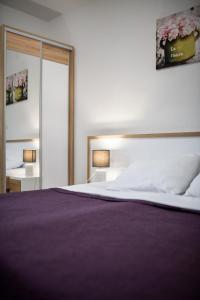 Postel nebo postele na pokoji v ubytování Apartments Diora