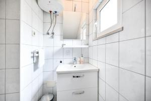 Koupelna v ubytování Apartments Diora