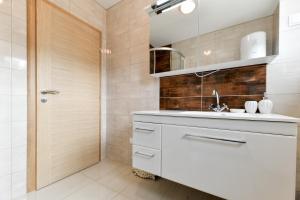 Koupelna v ubytování Apartments Diora