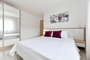 Postel nebo postele na pokoji v ubytování Apartments Diora