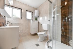 Koupelna v ubytování Apartments Diora