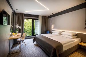 Postel nebo postele na pokoji v ubytování Hotel Istra - Liburnia