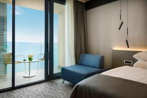 Postel nebo postele na pokoji v ubytování Hotel Istra - Liburnia