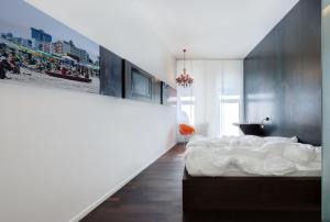 Postel nebo postele na pokoji v ubytování Boutique Hotel Imperialart