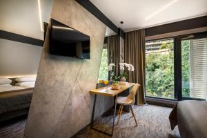 TV a/nebo společenská místnost v ubytování Hotel Istra - Liburnia