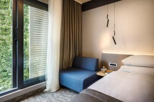 Postel nebo postele na pokoji v ubytování Hotel Istra - Liburnia