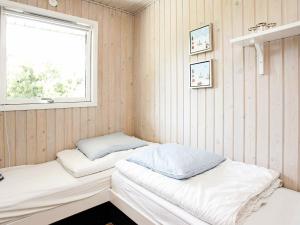 Postel nebo postele na pokoji v ubytování 6 person holiday home in Pandrup-By Traum + 6 fotografií