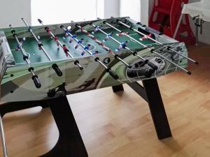a glass pool table with a rack on it at 6 person holiday home in Lemvig in Ferring