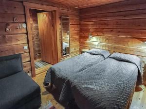 Postel nebo postele na pokoji v ubytování Holiday Home Sompsanniemi by Interhome