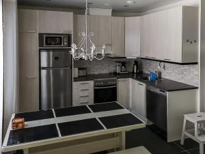 Køkken eller tekøkken på Holiday Home Rukamaja by Interhome