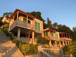 a row of houses on top of a hill at Green Hills Batumi in Batumi +17 photos