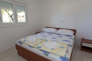 A bed or beds in a room at Villa Filip