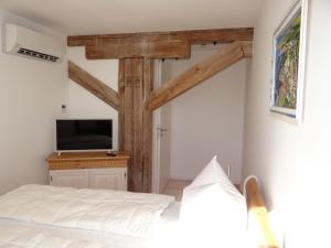 Postel nebo postele na pokoji v ubytování Speicher Residenz Barth E2 App10