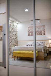 Posteľ alebo postele v izbe v ubytovaní Apartments Diora