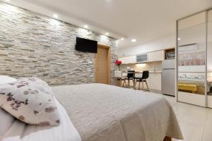 Kuchyň nebo kuchyňský kout v ubytování Apartments Diora