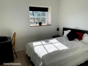 Letto o letti in una camera di Essenbaekgaard B&B