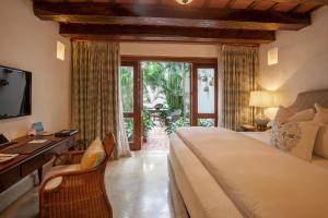 Postel nebo postele na pokoji v ubytování Hotel Casa San Agustin
