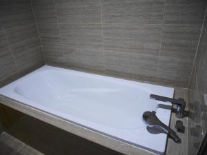 Fotografie z fotogalerie ubytování Fairview House apartment karawaci v destinaci Karawaci