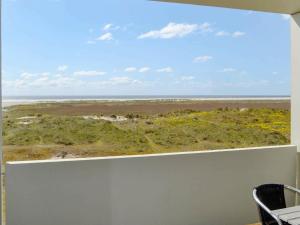 - Balcón con 2 sillas y vistas al océano en 4 person holiday home in Fan, en Fanø