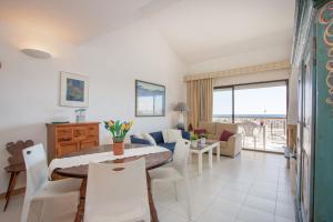 A seating area at Apart-rent Apartamento Port Grec 0161