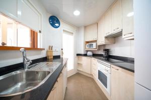 Kuchyň nebo kuchyňský kout v ubytování Apartamento Patricia