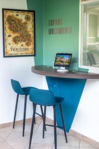 TV/Unterhaltungsangebot in der Unterkunft La Pagerie - Tropical Garden Hotel