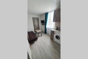 a view of a living room with a washing machine at Yerevan Studio in Yerevan