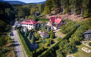 an aerial view of a house in a mountain at Leśny Dom in Długopole-Zdrój