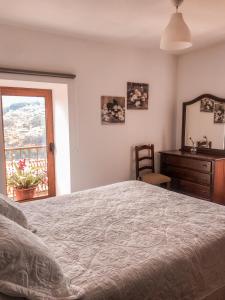 Postel nebo postele na pokoji v ubytování Casa Sambinho Gerês