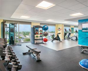 a gym with treadmills and exercise equipment in a building at Margaritaville Jacksonville Beach in Jacksonville Beach