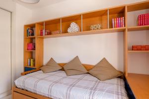 Posteľ alebo postele v izbe v ubytovaní Apartamento Residencial Bajondillo