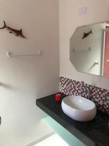 Koupelna v ubytování Casa de Luxo na Praia Cocanha - Condomínio Fechado