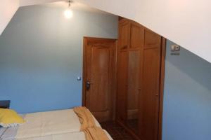 A bed or beds in a room at La casa de Aldán entre el mar y el bosque