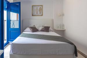 Posteľ alebo postele v izbe v ubytovaní Knysna Boutique Rooms