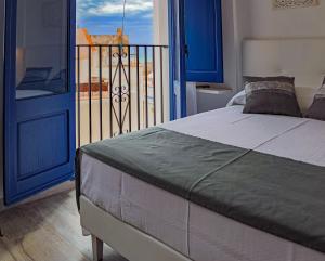Posteľ alebo postele v izbe v ubytovaní Knysna Boutique Rooms