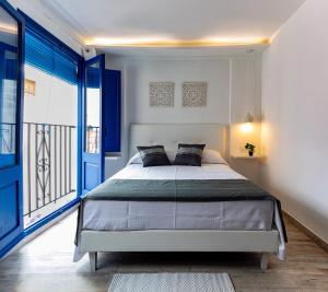 Posteľ alebo postele v izbe v ubytovaní Knysna Boutique Rooms