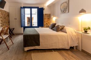 Posteľ alebo postele v izbe v ubytovaní Knysna Boutique Rooms